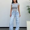 LIGHT BLUE RIPPED JEANS